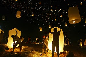 lamps are released into the sky in a ceremony commemorating the tsunami
