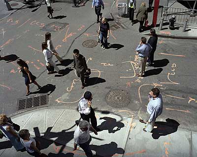 A man rinses soot from his face at the scene of a petrol pipeline explosion in Lagos, Nigeria.