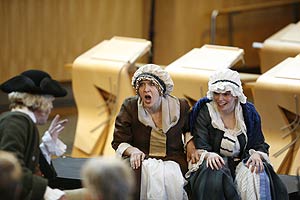 performers in the debating chamber. 