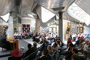 audience in the garden lobby of the Parliament 