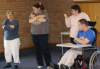 members of the theatre group in rehearsal 